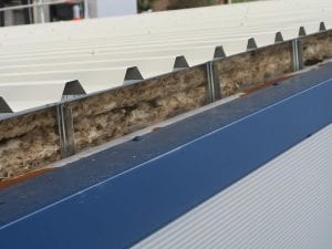 built-up metal roof showing insulation layer